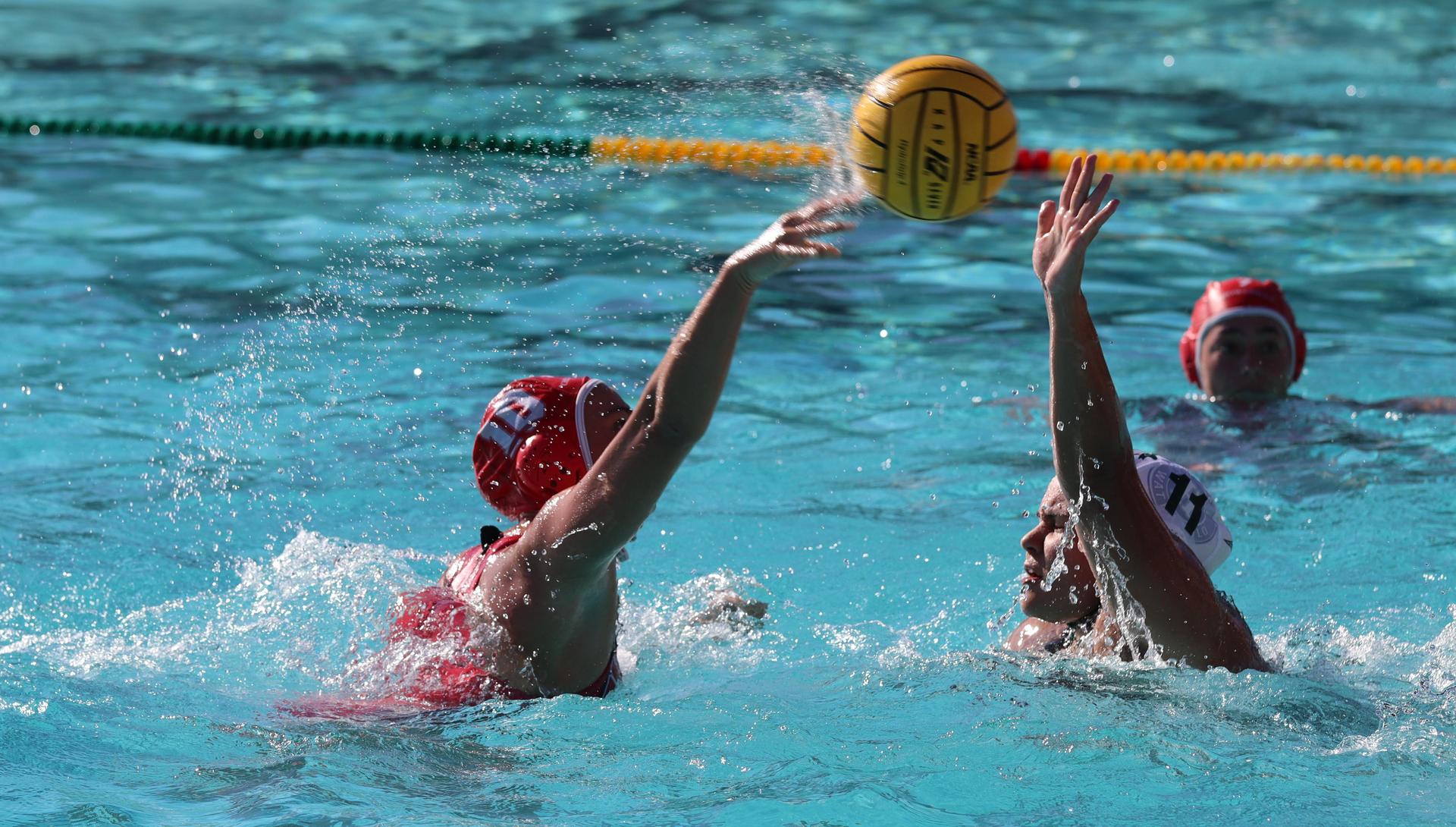 girls playing water polo against Hoover