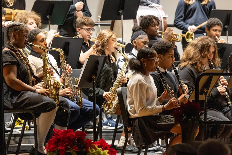 Eighth grade band members perform