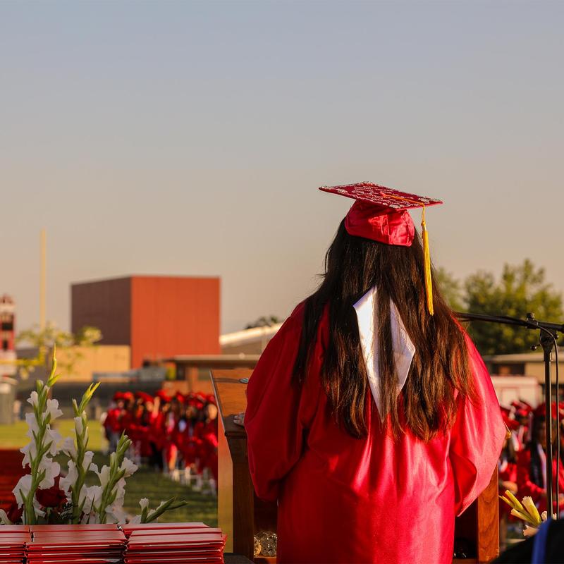 Graduate at podium