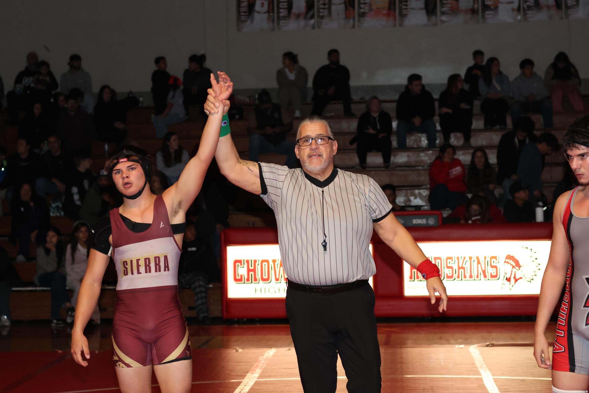 Wrestling winners with hands up 35
