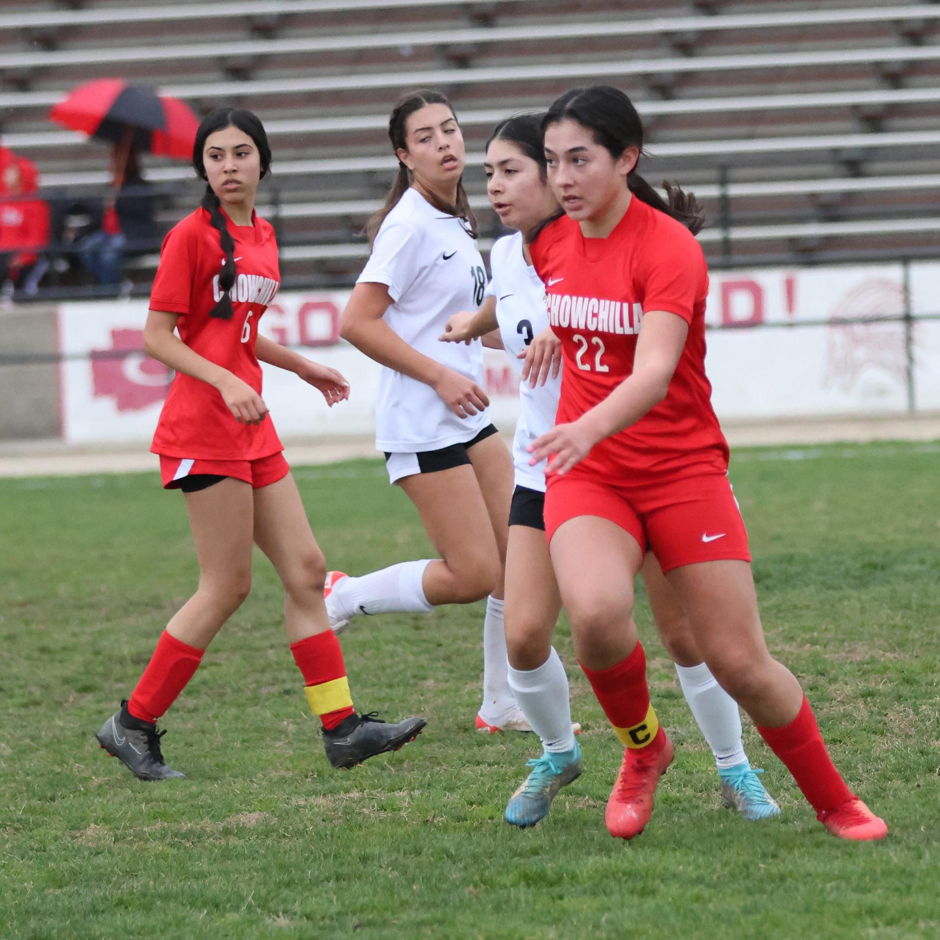 Junior varsity girls playing soccer against liberty