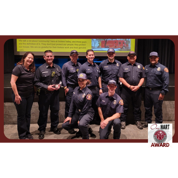 A group of firefighters posing for a photo
