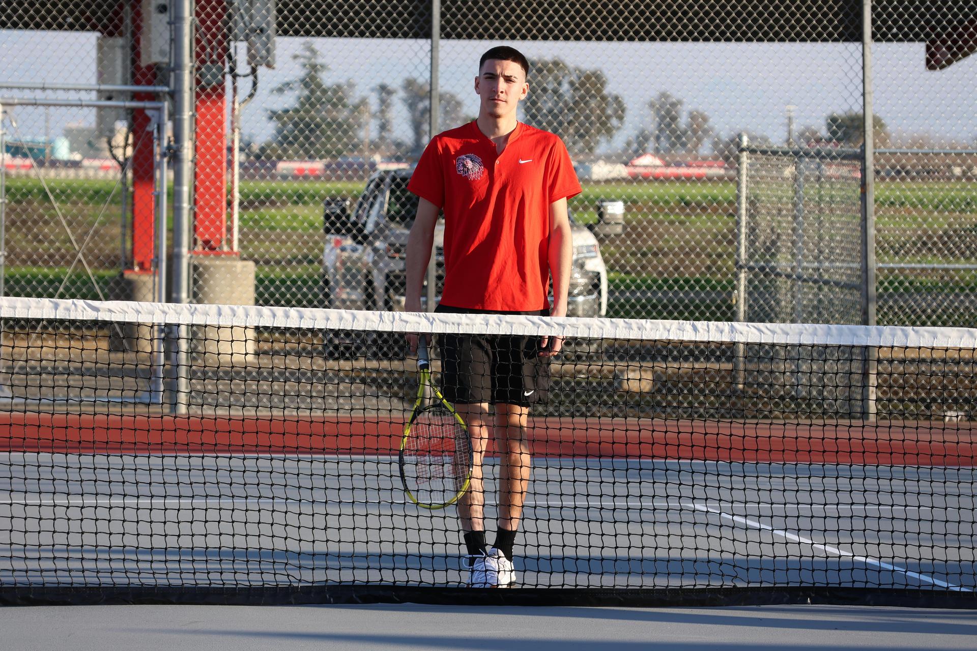CUHS Boys playing tennis against coalinga