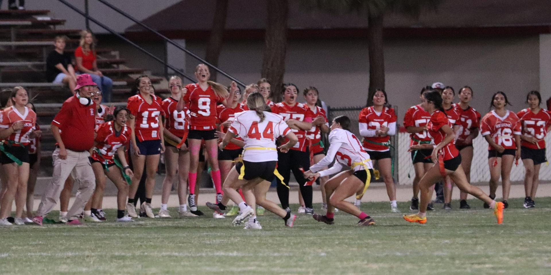 girls playing flag football
