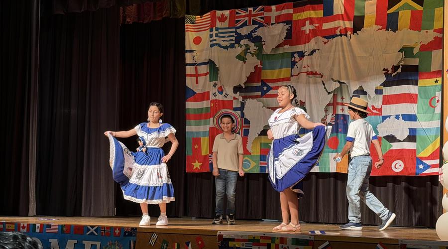 2 girls and 2 boys with el salvador traditional clothes