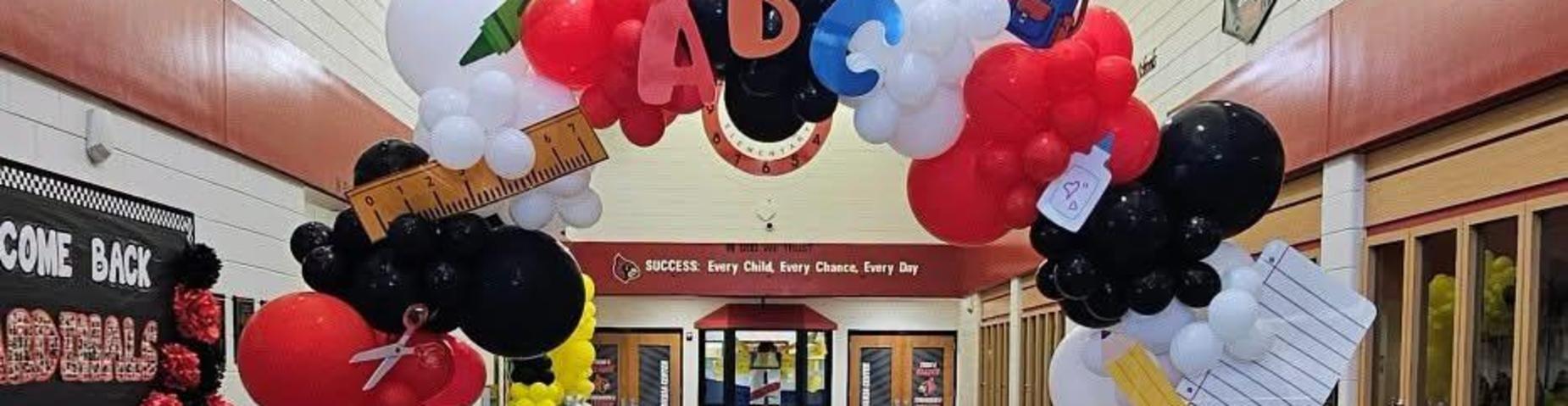 Balloon decorations for back to school in the front hallway