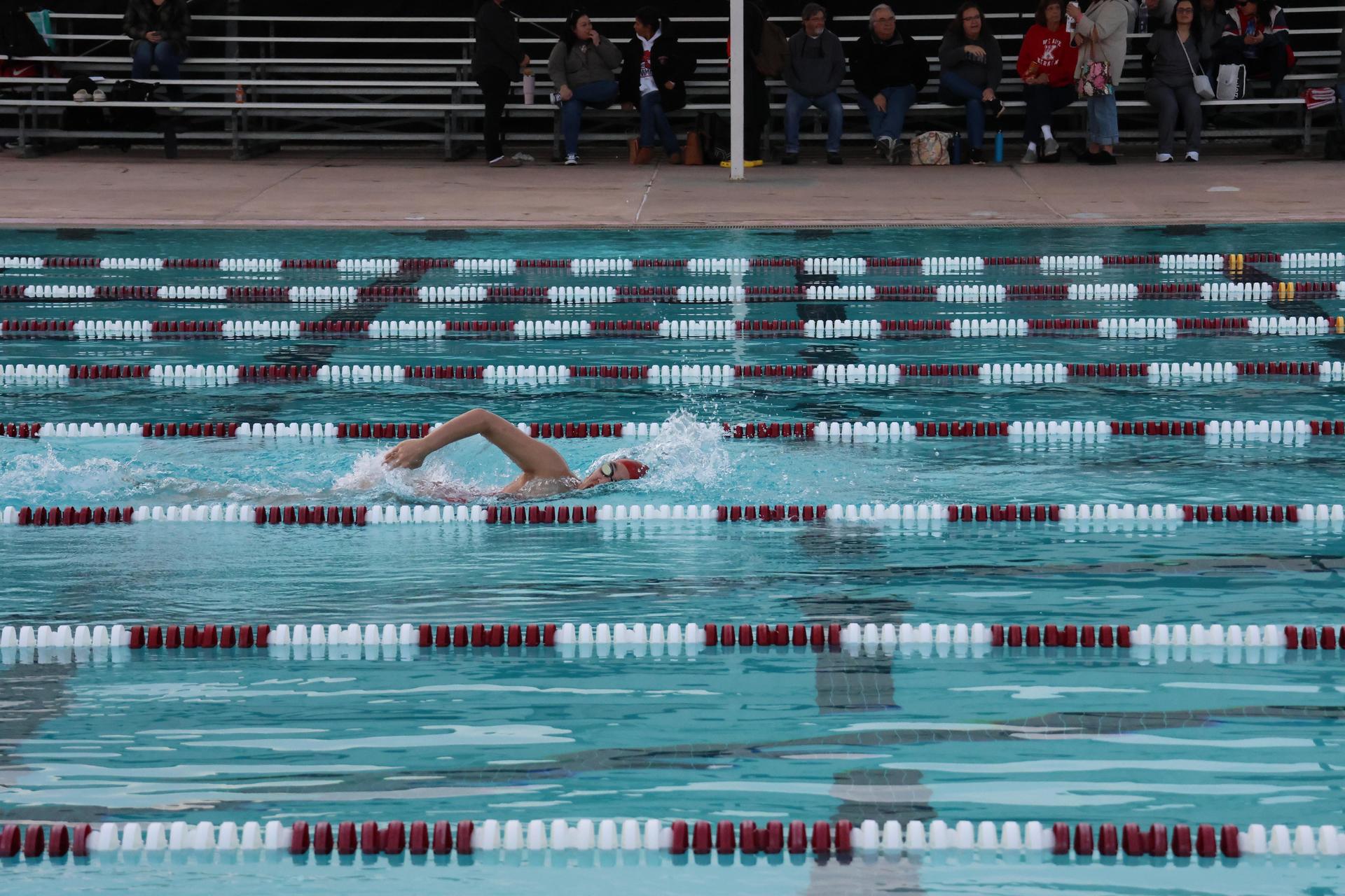 girls swimmers competing in the 400 free relay