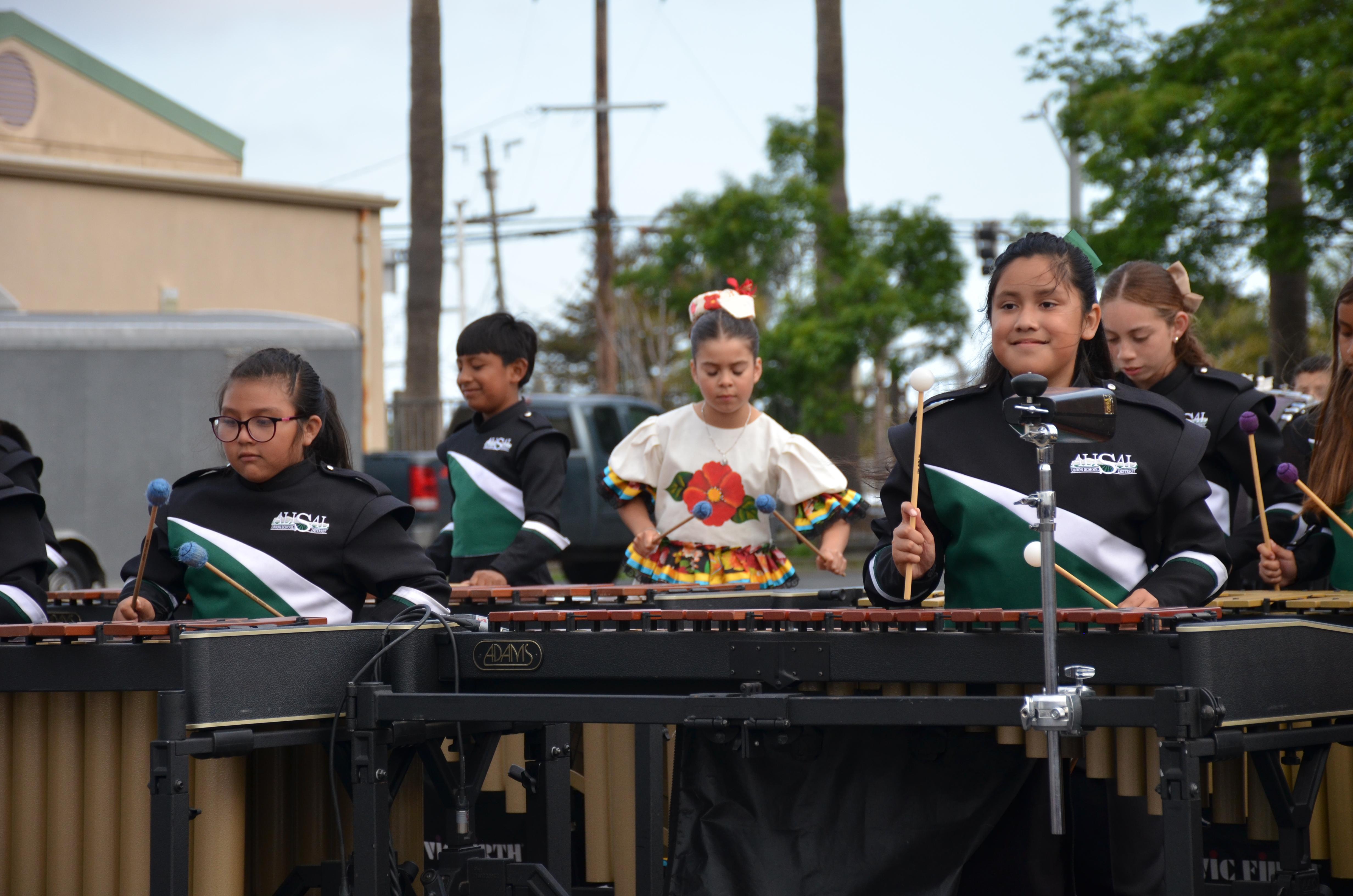 Children playing marimbas