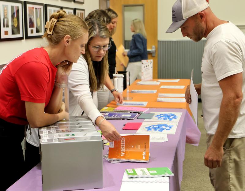 Comal ISD Dyslexia teachers speak with a parent