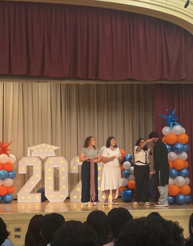 civic seal auditorium teachers and a student