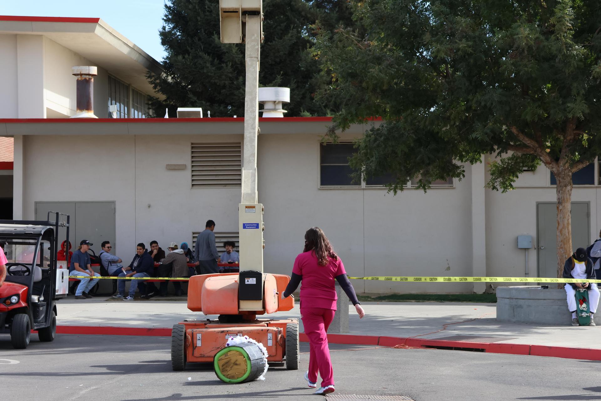 students and staff enjoying the pumpkin drop