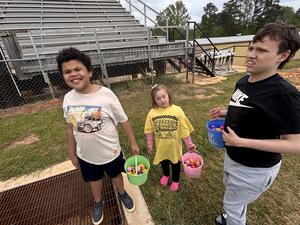Life Skills kids hunting Easter eggs.