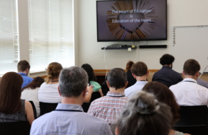Attendees listening to a session