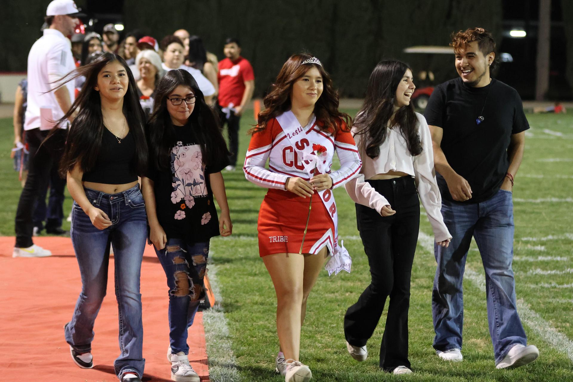 seniors and their escorts celebrating senior night