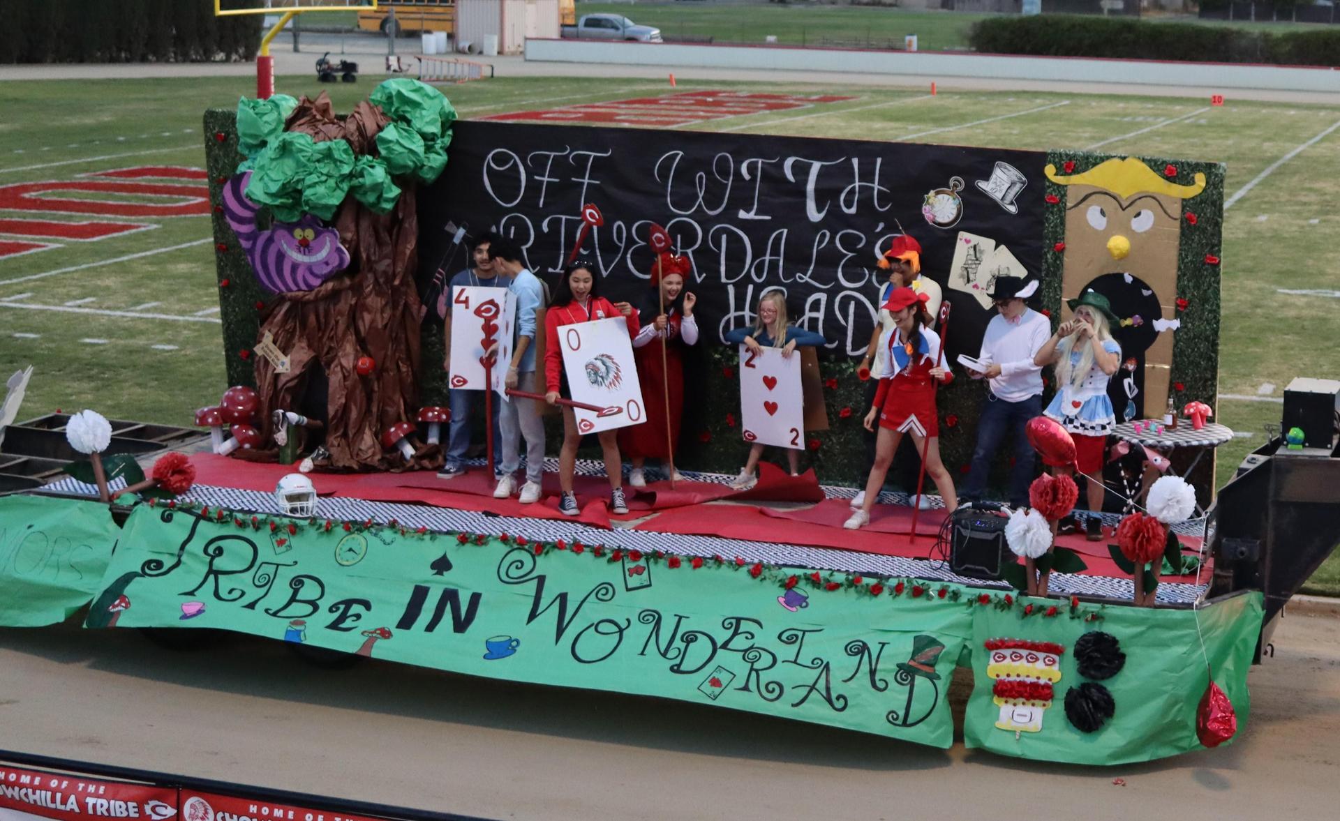 students, staff, and community members enjoying Friday night at the football game