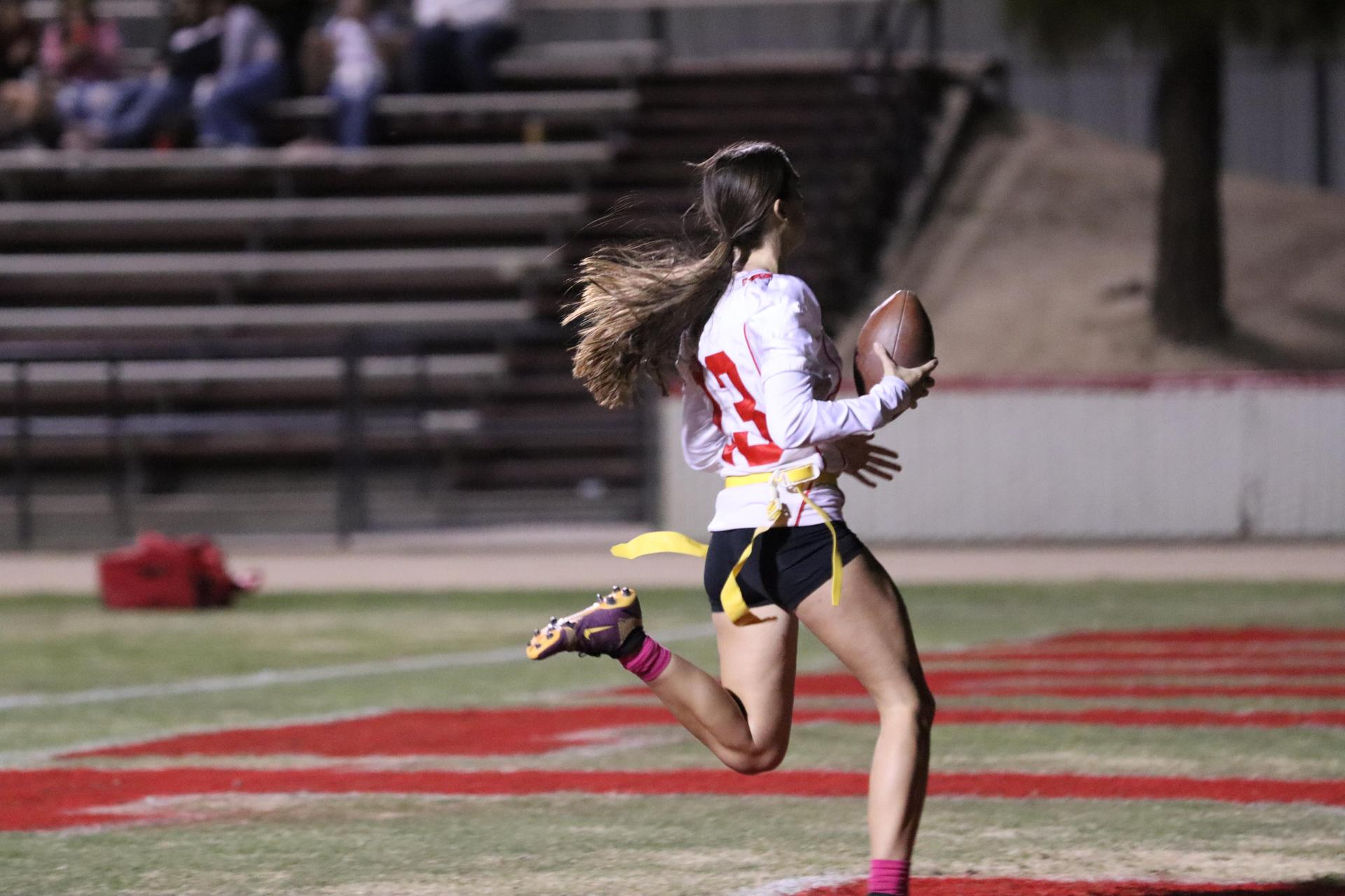 girls playing flag football