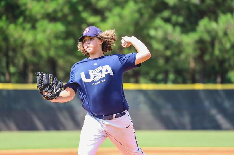Tucker Holland pitches in the USA Baseball 13U NTIS this summer.