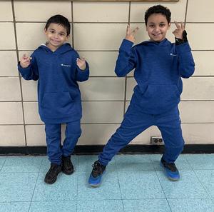 Students in blue matching outfits