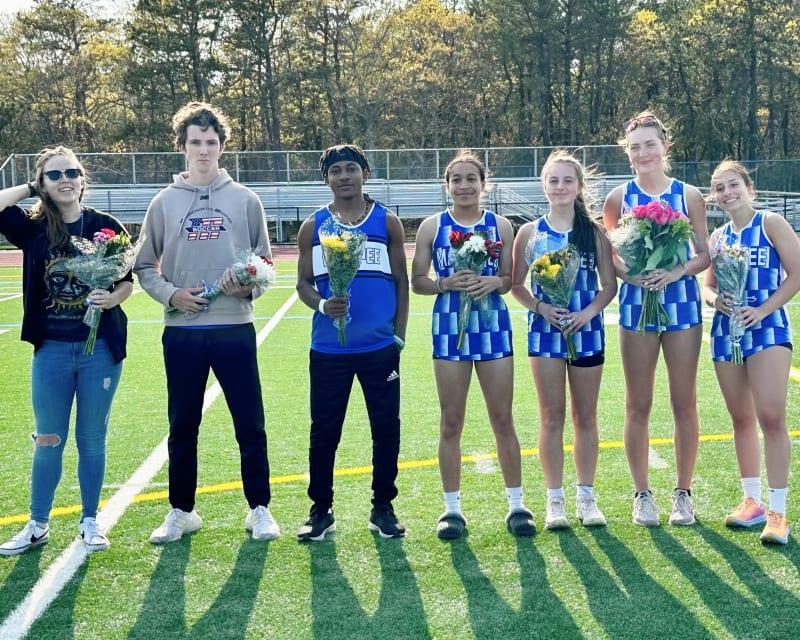 Track players lined up on senior night