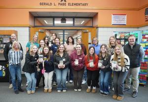 Thornapple Kellogg High School Youth Advisory Council members along with representatives of local charities.