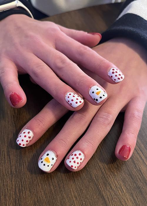 Daphne's painted nails.