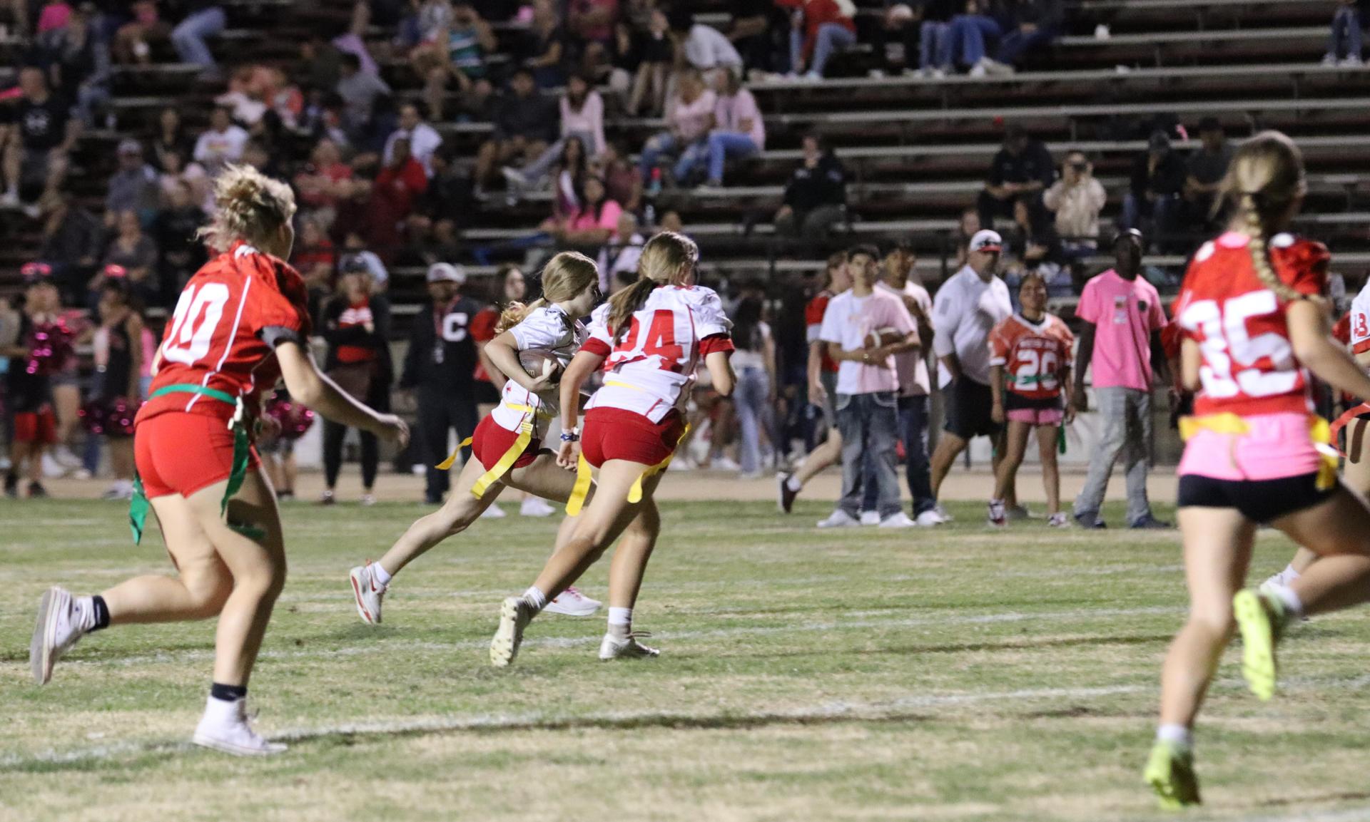girls playing flag football