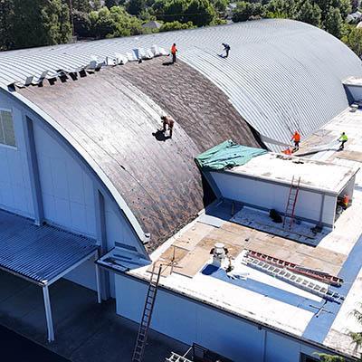 aerial view of TMC east gym roofing work