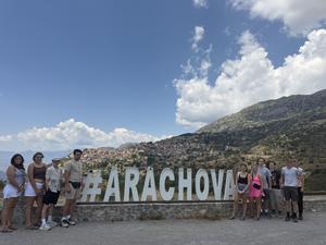 MCS students stand in front of Arachova sign