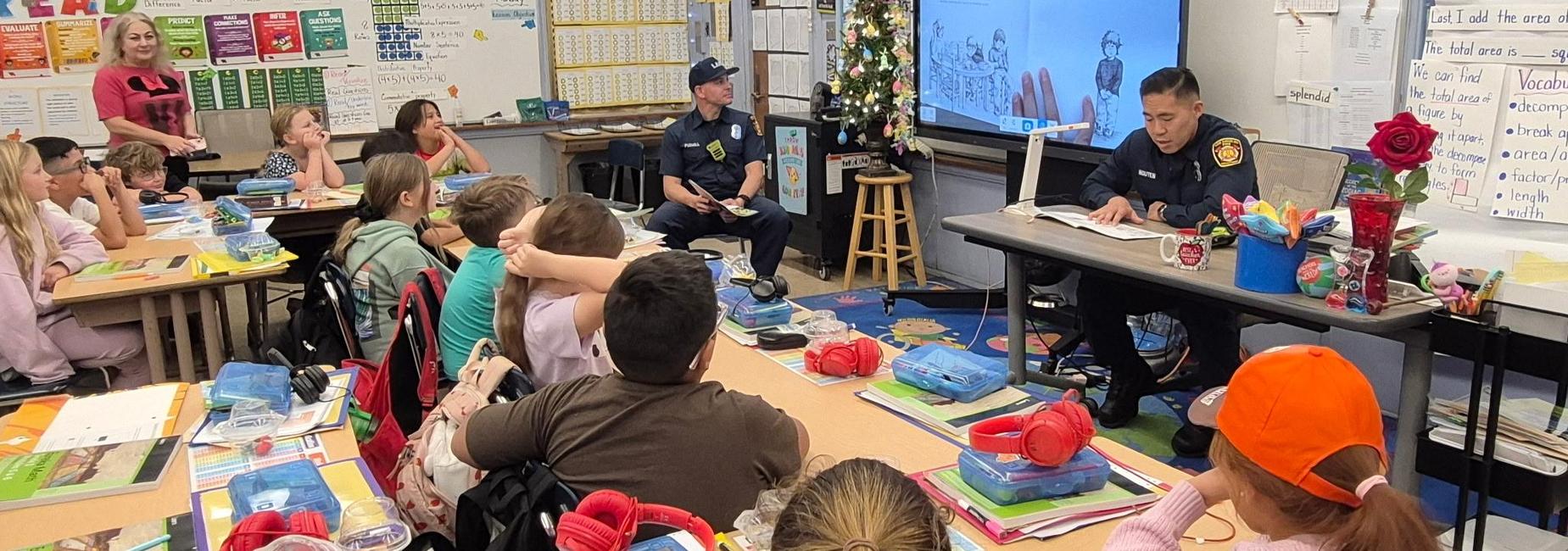 Firefighters reading to students for Read Across America