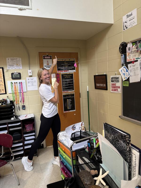 Student posing during experiment