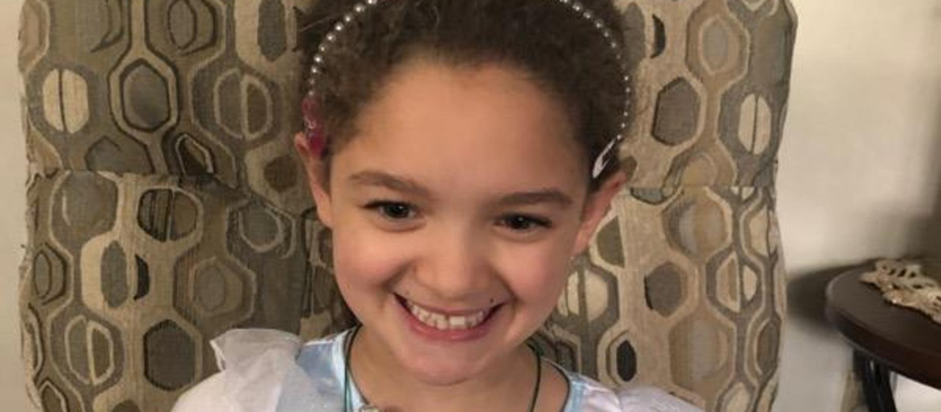 girl smiling for the camera
