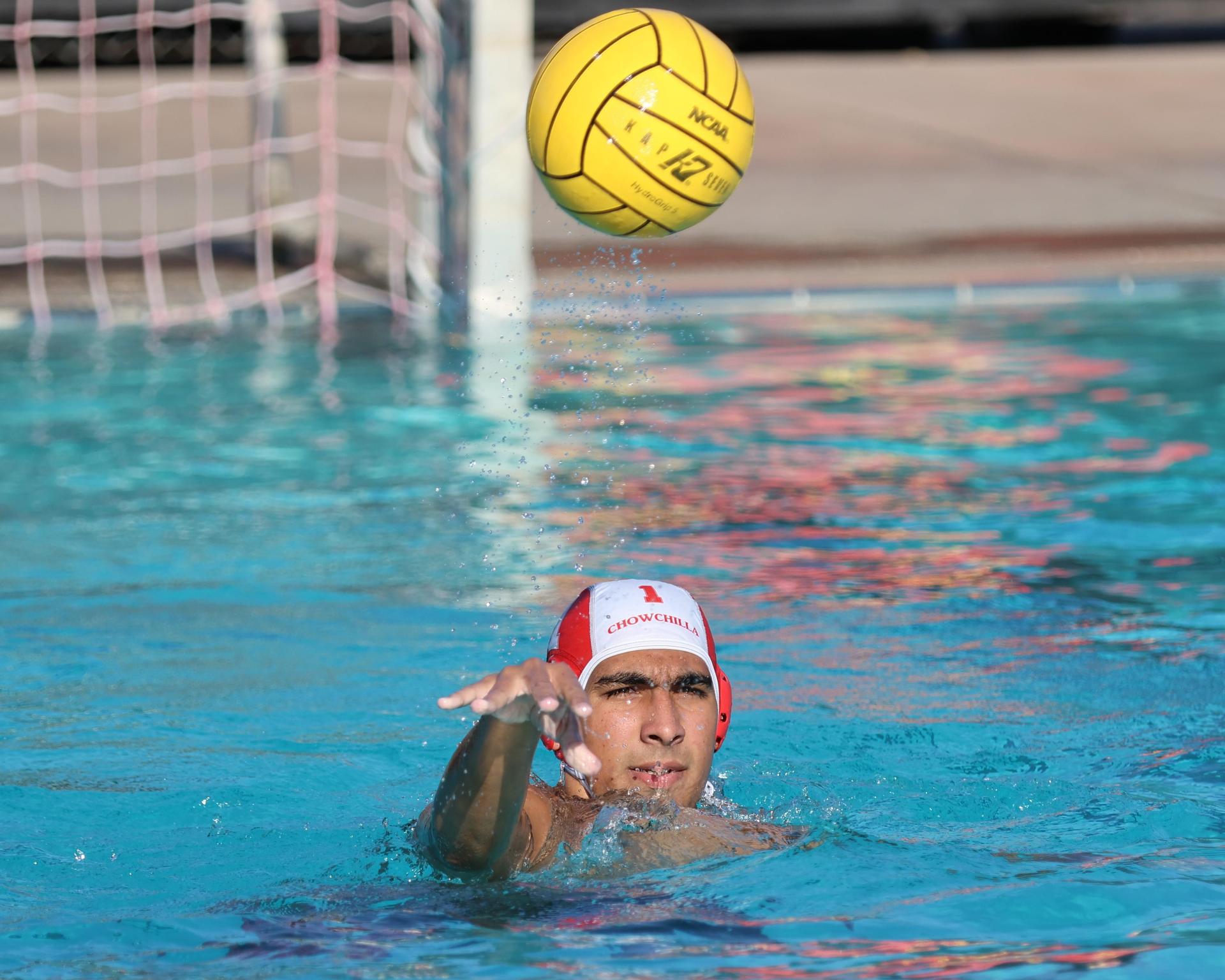 Boys playing water polo against Yosemite