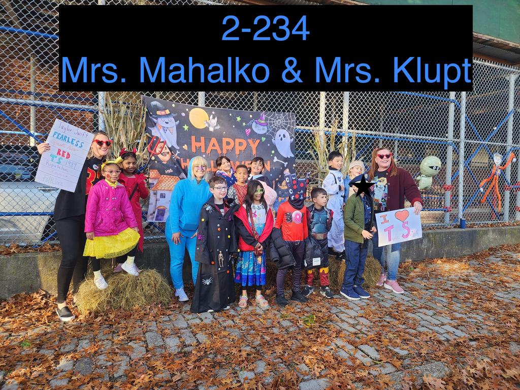 staff and students in halloween costumes