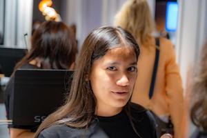 student at board meeting