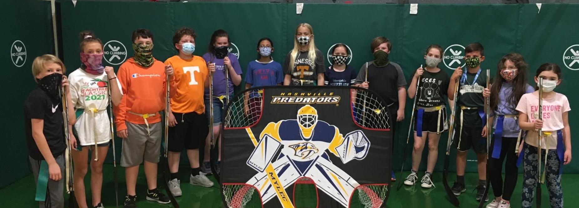 4th graders playing hockey