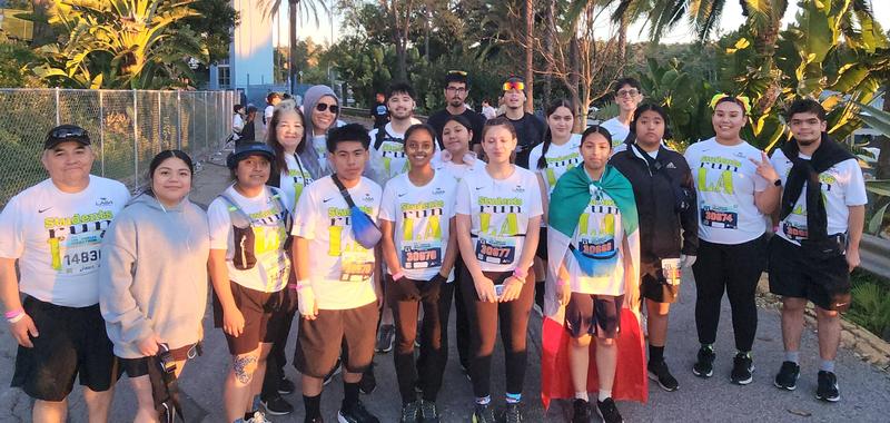 Students pose at Dodger Stadium on Marathon morning