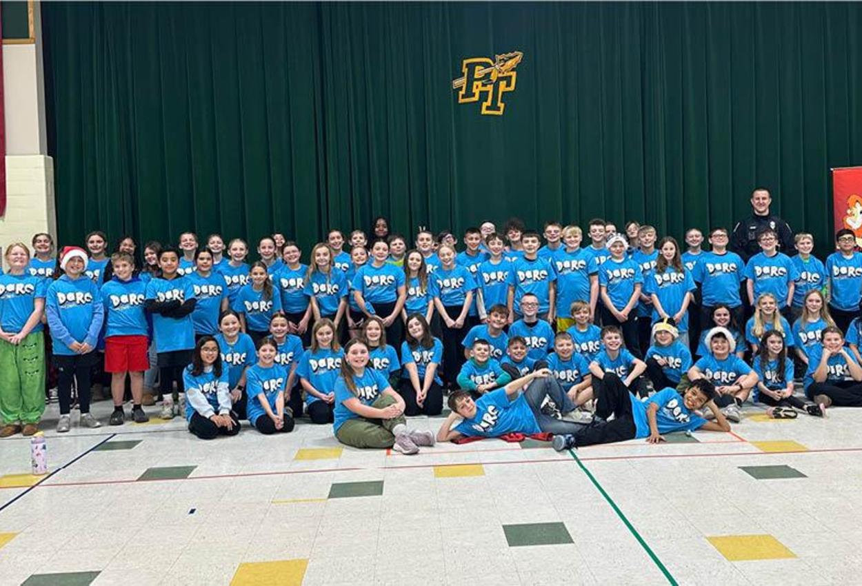 Harrison Park 5th-graders celebrate completion of the DARE program in the multipurpose room