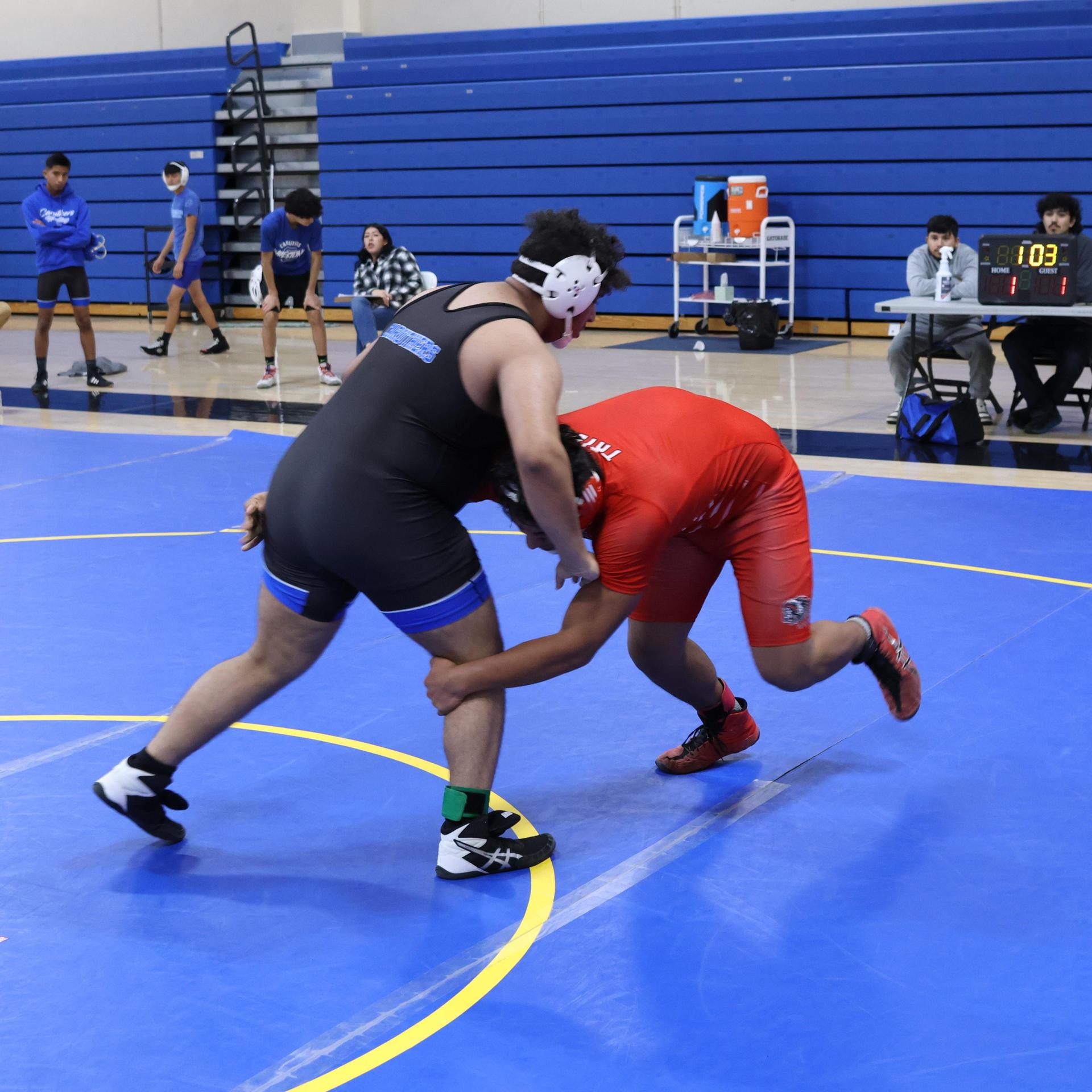 wrestlers in action at parlier