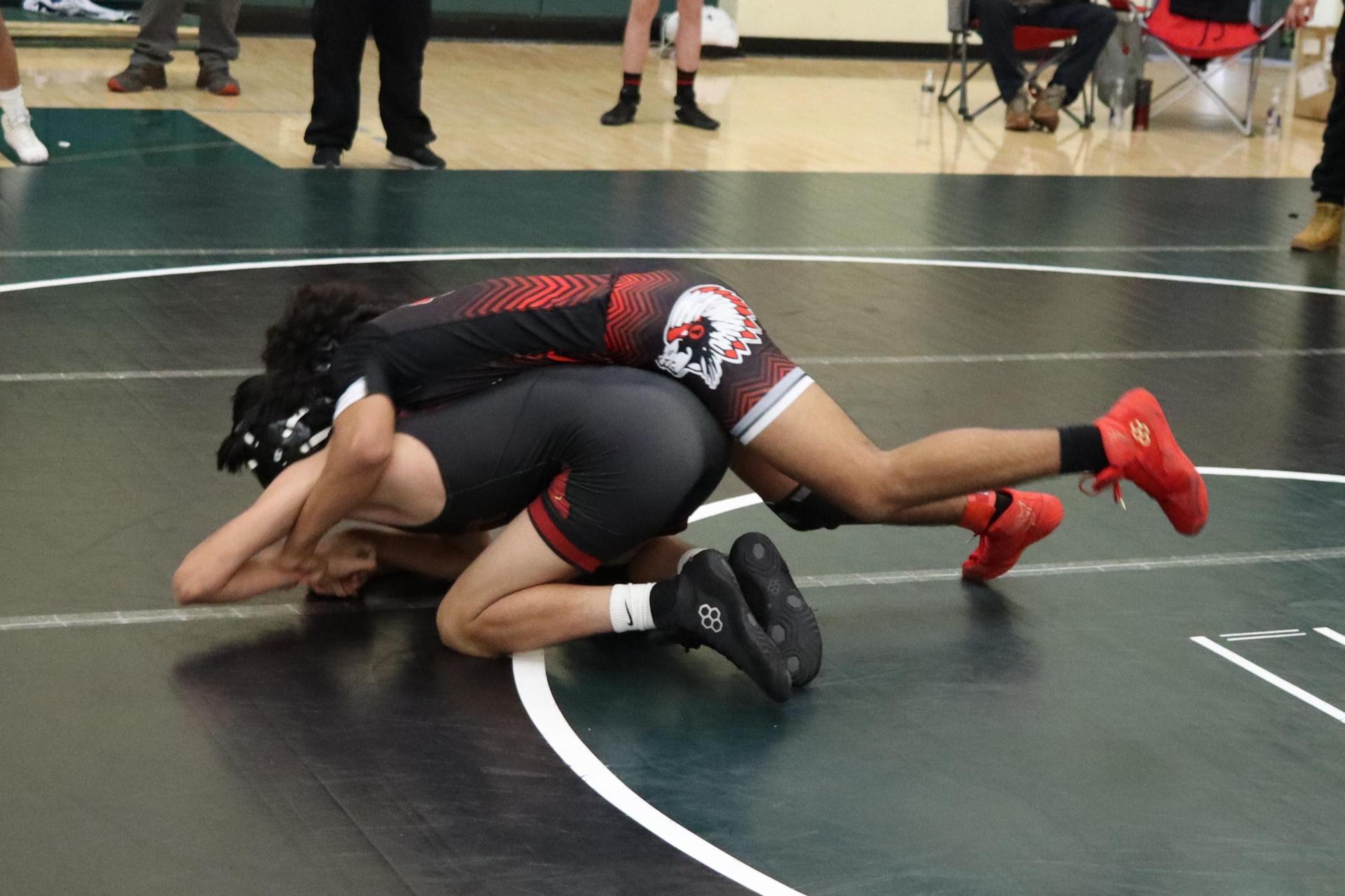 wrestlers in action at the Hawks invitational