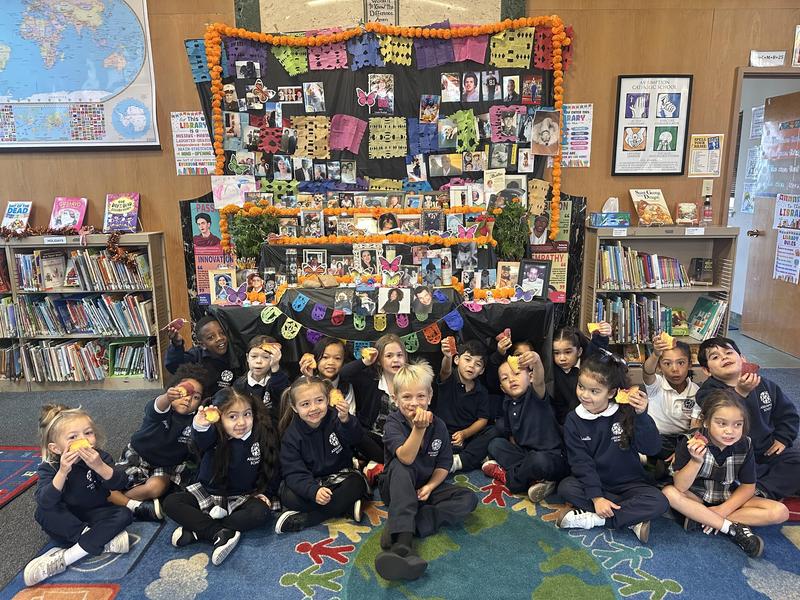 picture of JK students in front of ofrenda