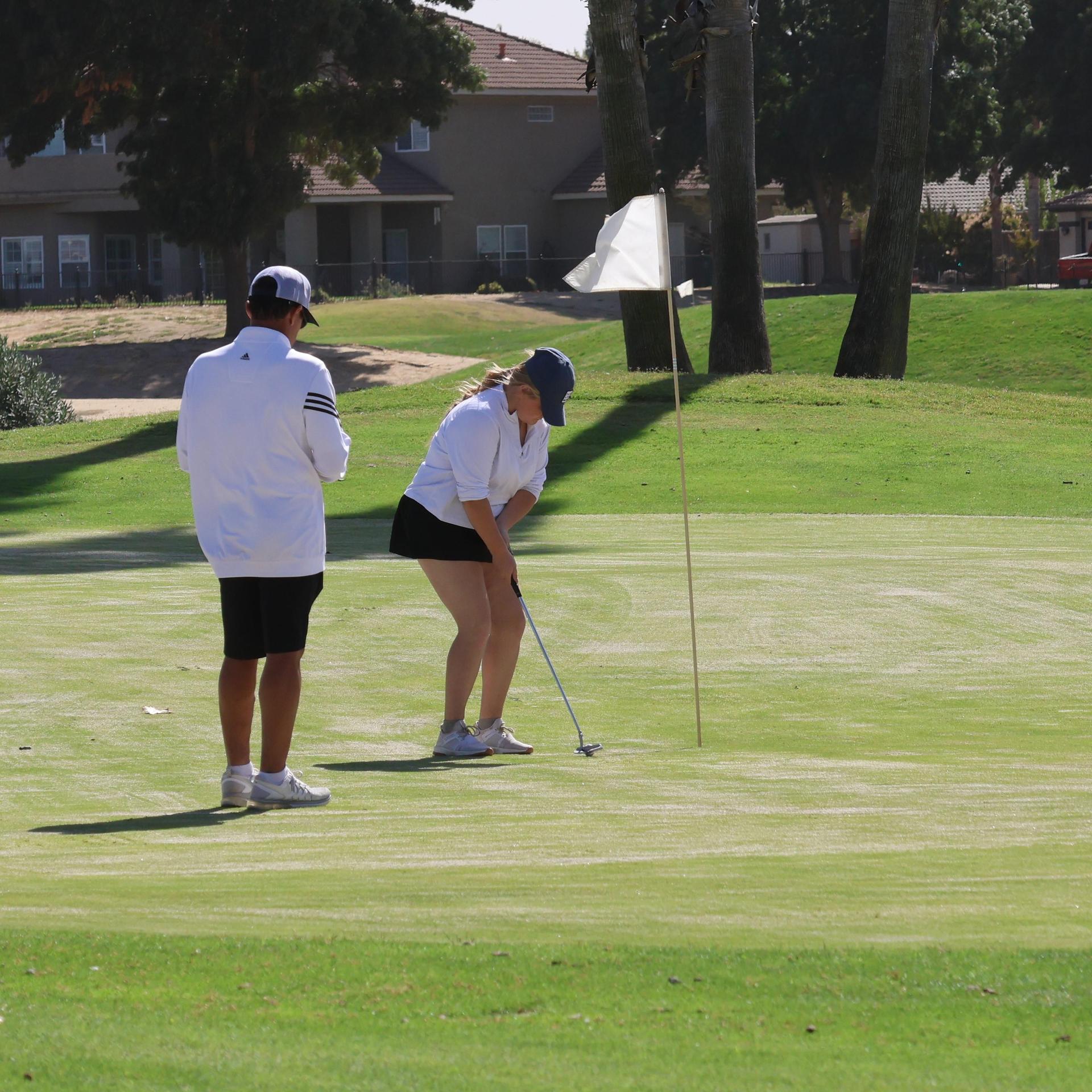 Girls golfers in action at the championships