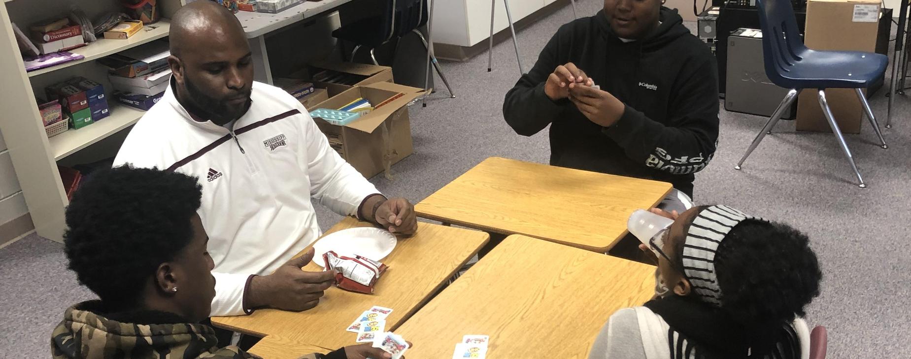 Mr. Magee enjoying UNO with students!
