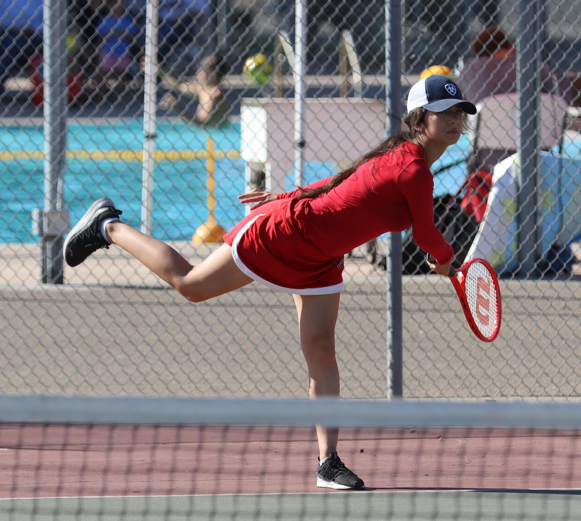 girls playing tennis against Golden Valley