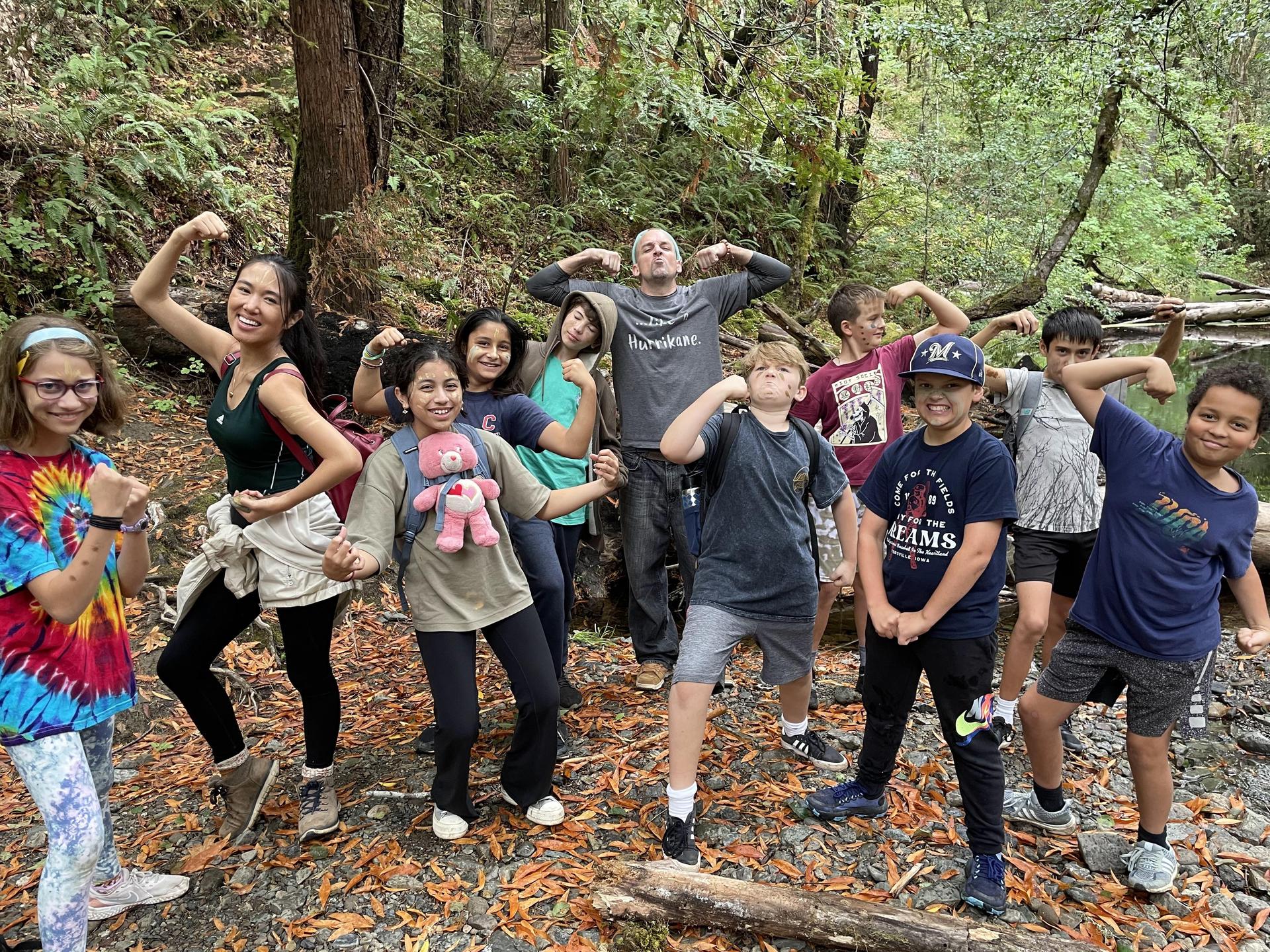 Students posing with muscle arms