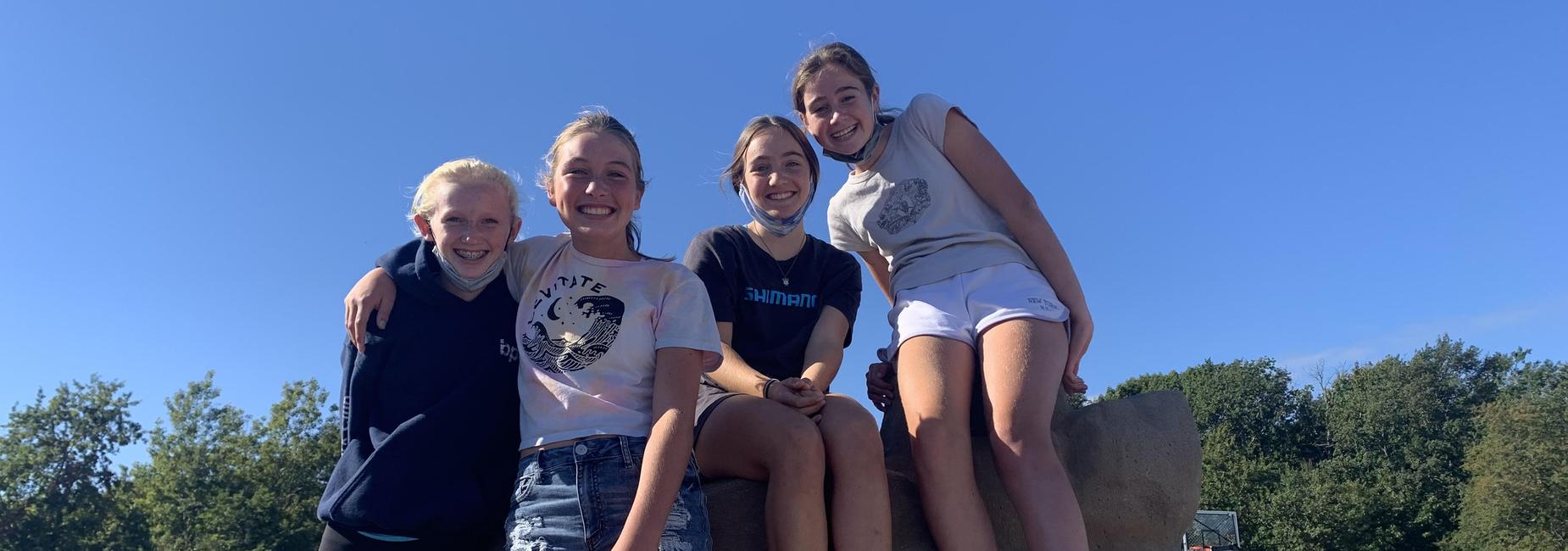 7th grade girls on at the climbing rocks