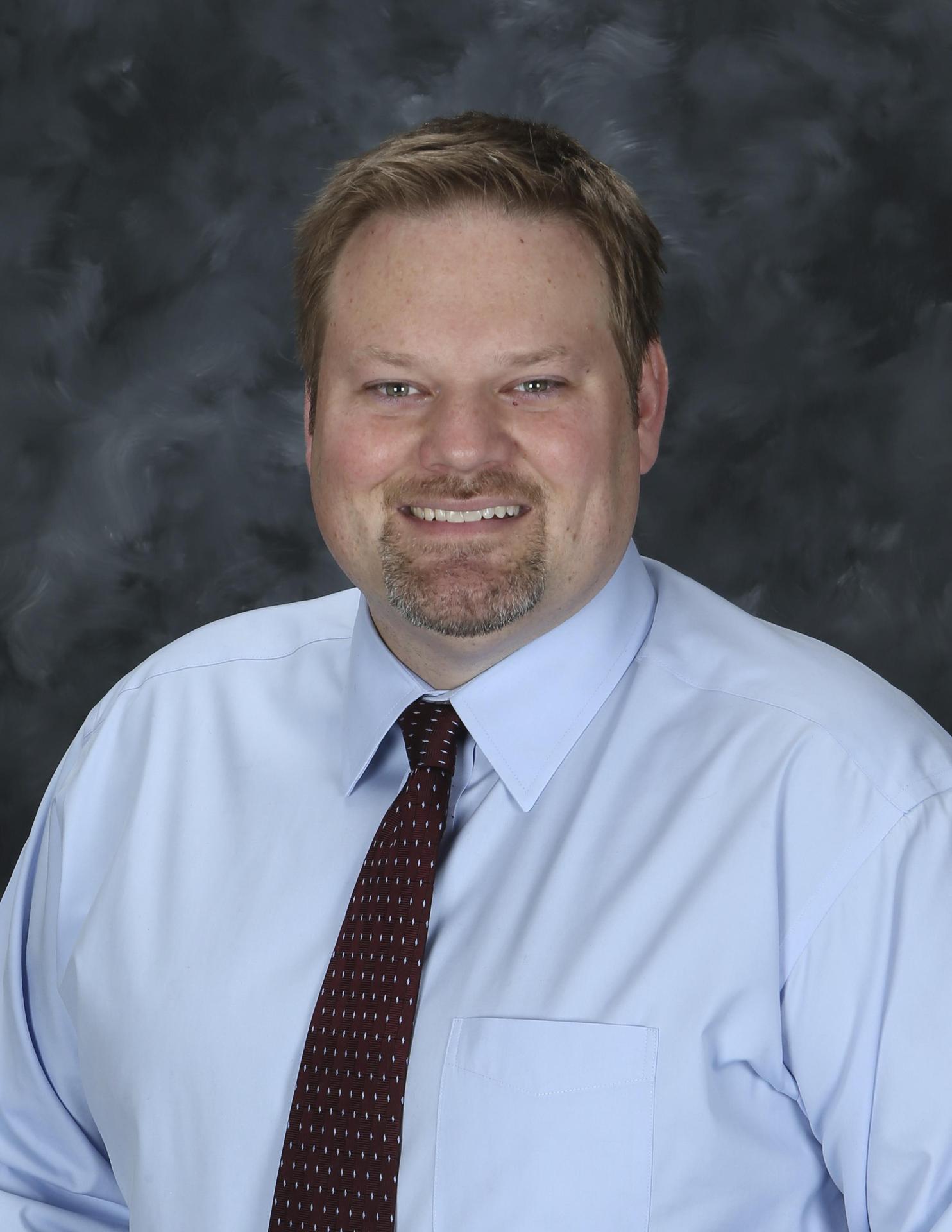 Headshot of Dr. Brian Cinnamon