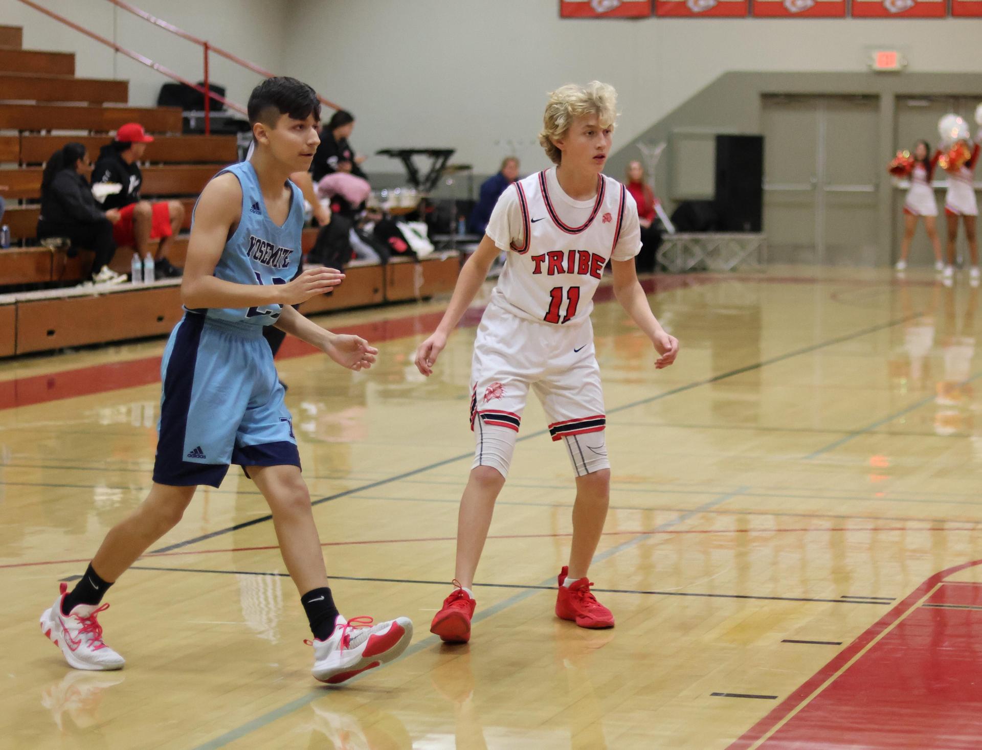 junior varsity boys playing basketball against yosemite