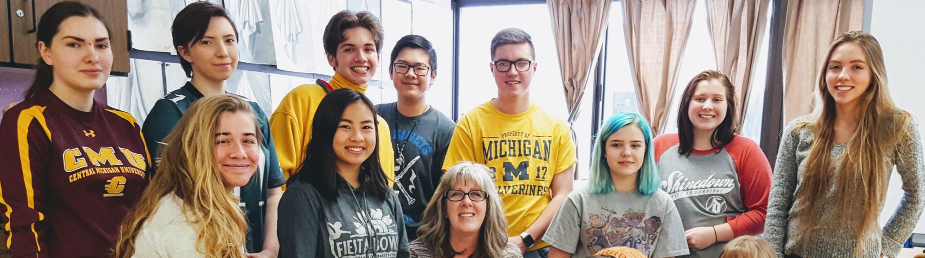 Mrs. Debord and some of her Art students