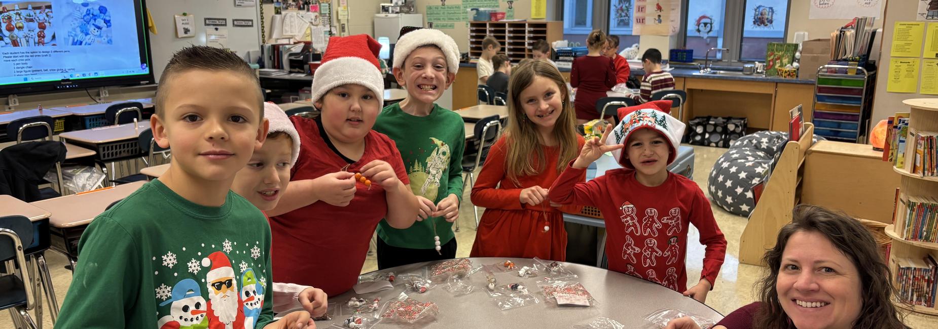 Group of 6 students completing a holiday craft