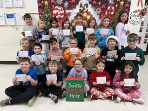 Students in Amy Foley’s second grade class at Coal City Elementary School await the arrival of Santa Claus. The children wrote letters to the jolly old elf and  sent them off to the North Pole after sharing with us. The students are asking Santa for a variety of items including laptops, Roblox, gaming systems and Labubus.